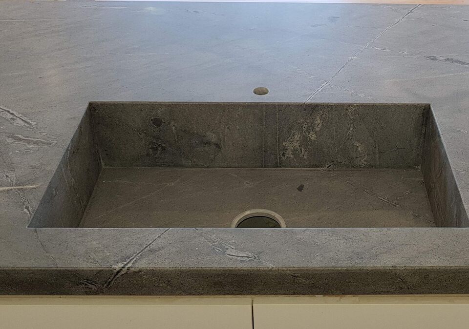 A stone kitchen sink